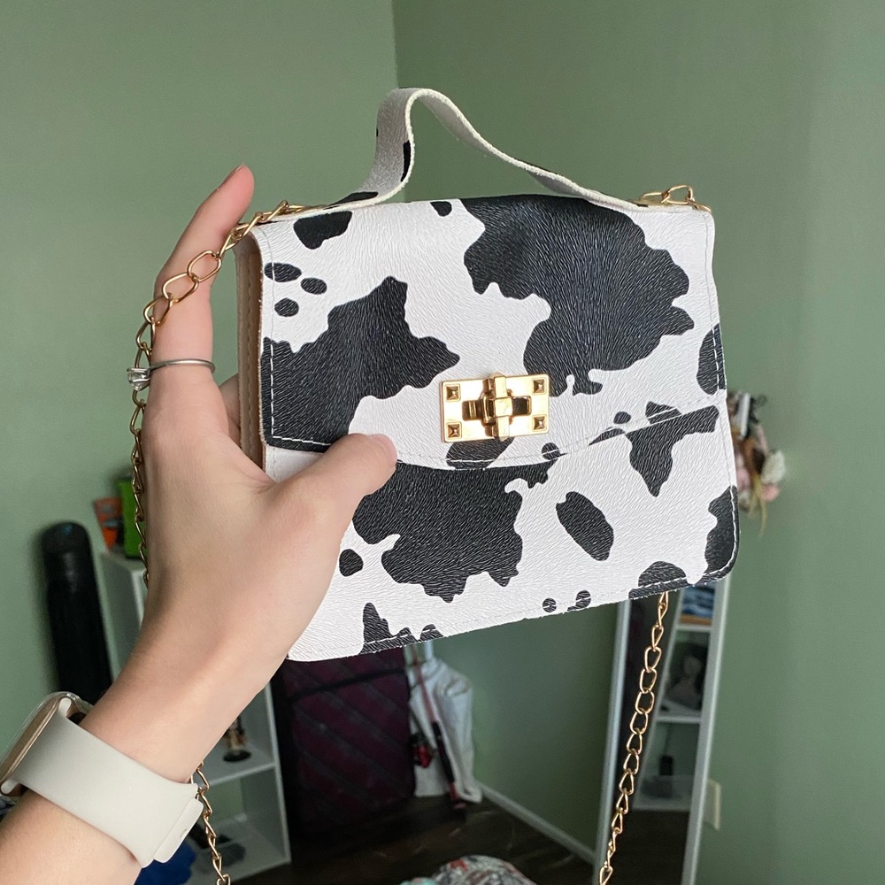 COW PRINT BAG ~ has a few stains on the inside.